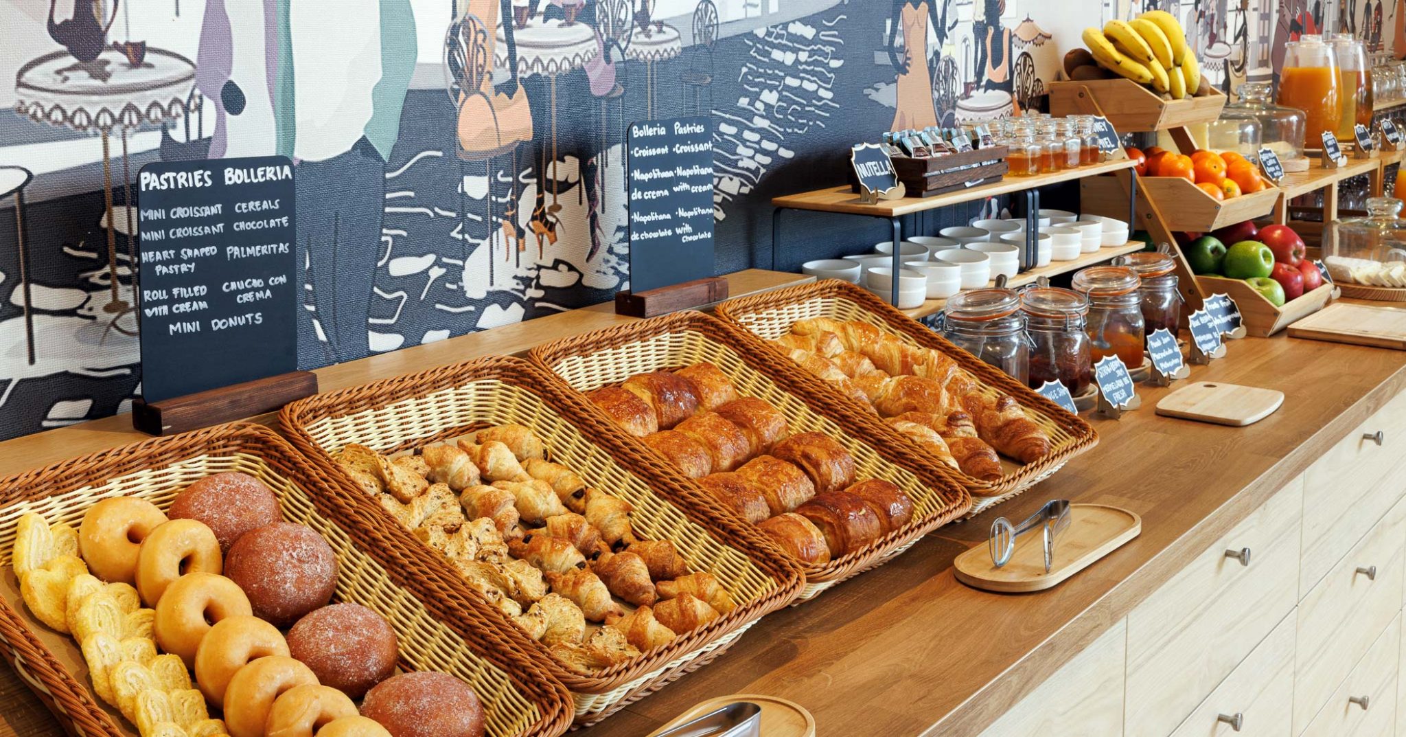 Wide view of the buffet breakfast area at Hotel Ronda Lesseps